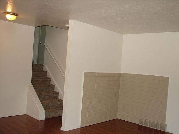 Partial Living Room/Steps to 2 Carpeted bedrooms and bath