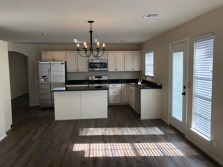 kitchen is open to dining and living room.