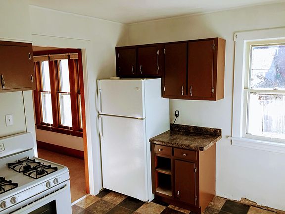 Freshly painted kitchen and cabinets with refrigerator new i