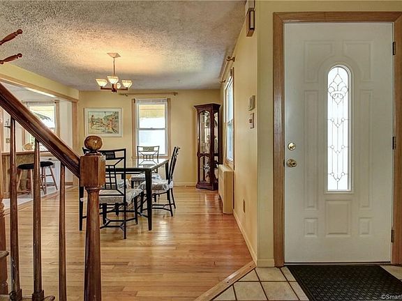 Pretty entry door & tile floor greets your guests!