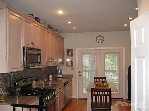 Kitchen w/ French Doors to Deck
