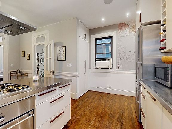 3rd image of 126 E 12th St APT 6A