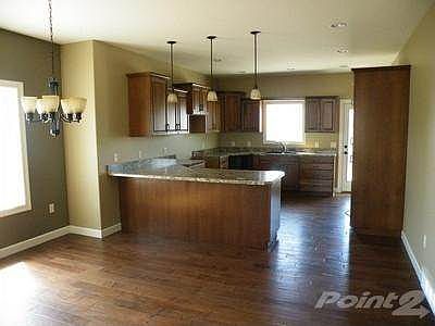 Dining area looking into kitchen