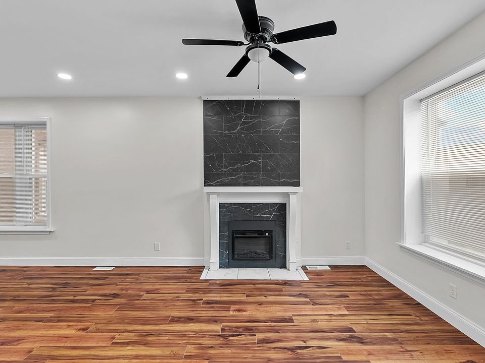 Very bright living room with numerous windows.