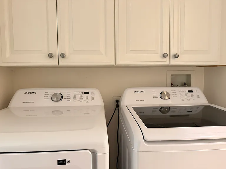 Laundry room with washer and dryer