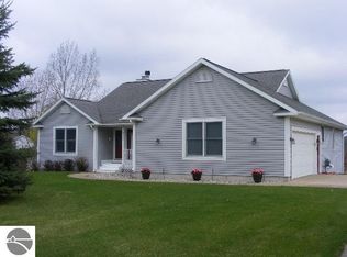 9376 Mockingbird Ln, Cadillac, MI 49601