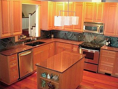 granite counters, custom clear fir cabinets, stainless steel appliances