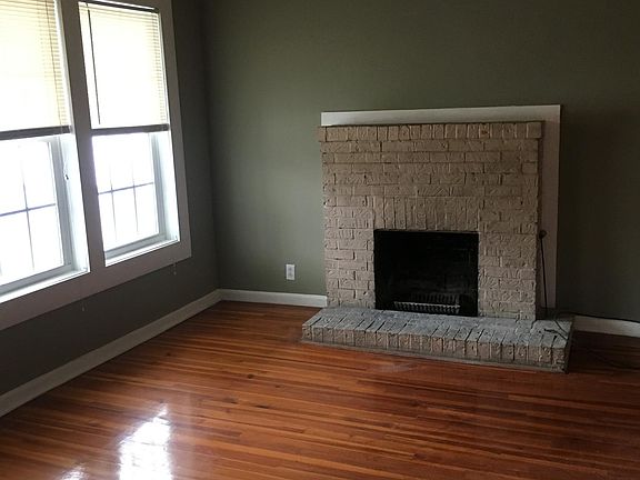 Den w/ wood fireplace