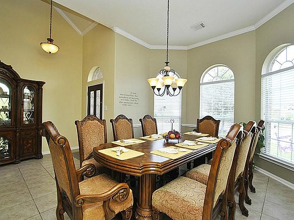 Spacious dining room with high ceilings