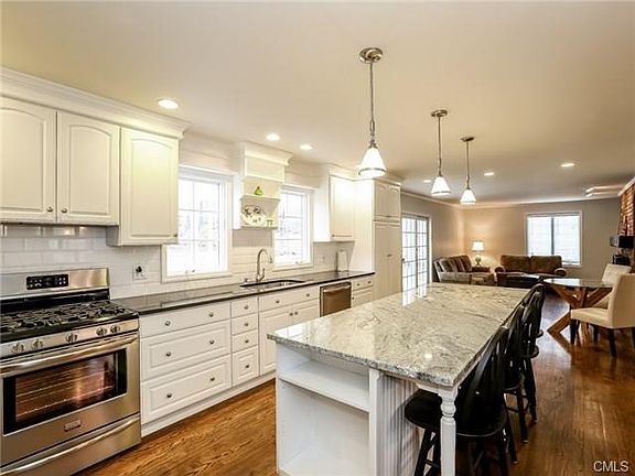Updated kitchen with all new stainless appliances and granite counters.