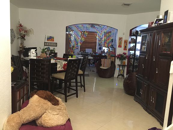 living room and dining room, window to the patio