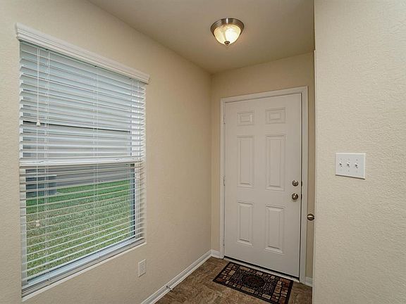 Upon entering you will feel the warmth of this fabulous home