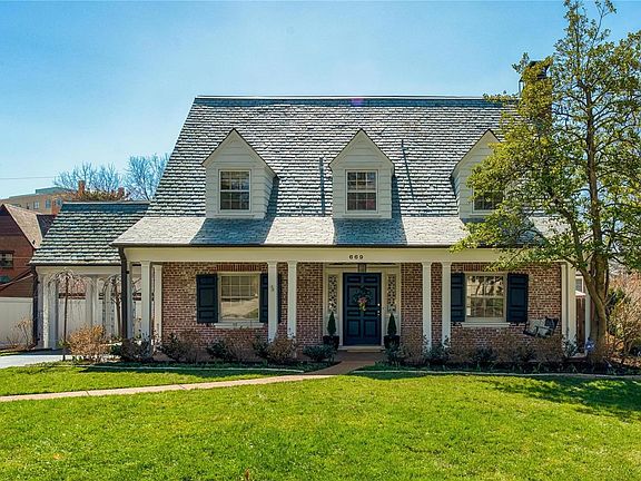 Modest it is not.  This is a family home no matter what size that means. The beautiful slate roof is such an asset on this special home.
