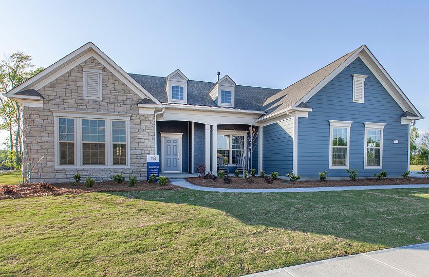 Dunwoody Way Exterior 5 features stone, siding, covered front porch and 2 car side load garage