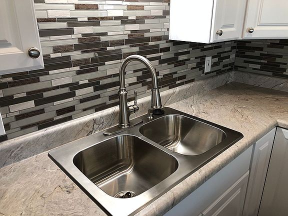 Stainless steel sink/faucet