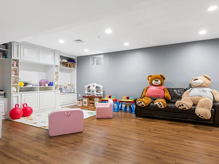 Finished walk-out lower level with full bathroom and possible bedroom and office space