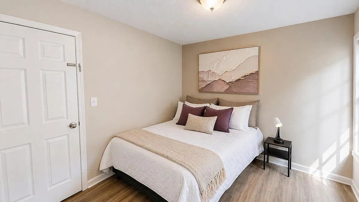Well-kept bedroom with a full-size bed, bedside table and lamp, and a window for natural light and everyday comfort. - Bantry Ct
