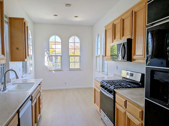 Kitchen - built in refrigerator and brand new appliances (range, microwave hood, Bosch dishwasher)