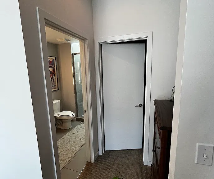 Primary Bathroom and Closet. See space for additional desk, dresser or vanity