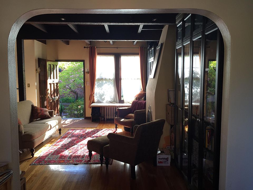 Livingroom view through arch of dining area.