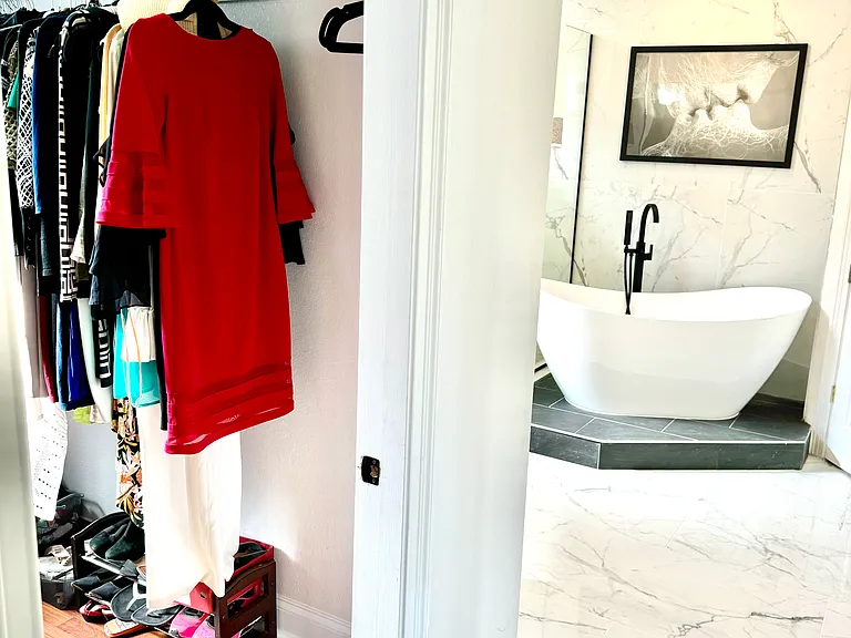 Master Suite Hers Walk-in closet (windows)