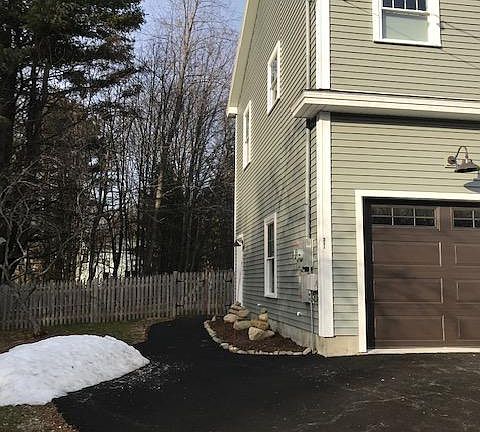 Parking, entrance and small yard for tenant. Garage parking for winter storms. Drive way plowing services included. Tenant responsible for apartment entrance snow removal.
