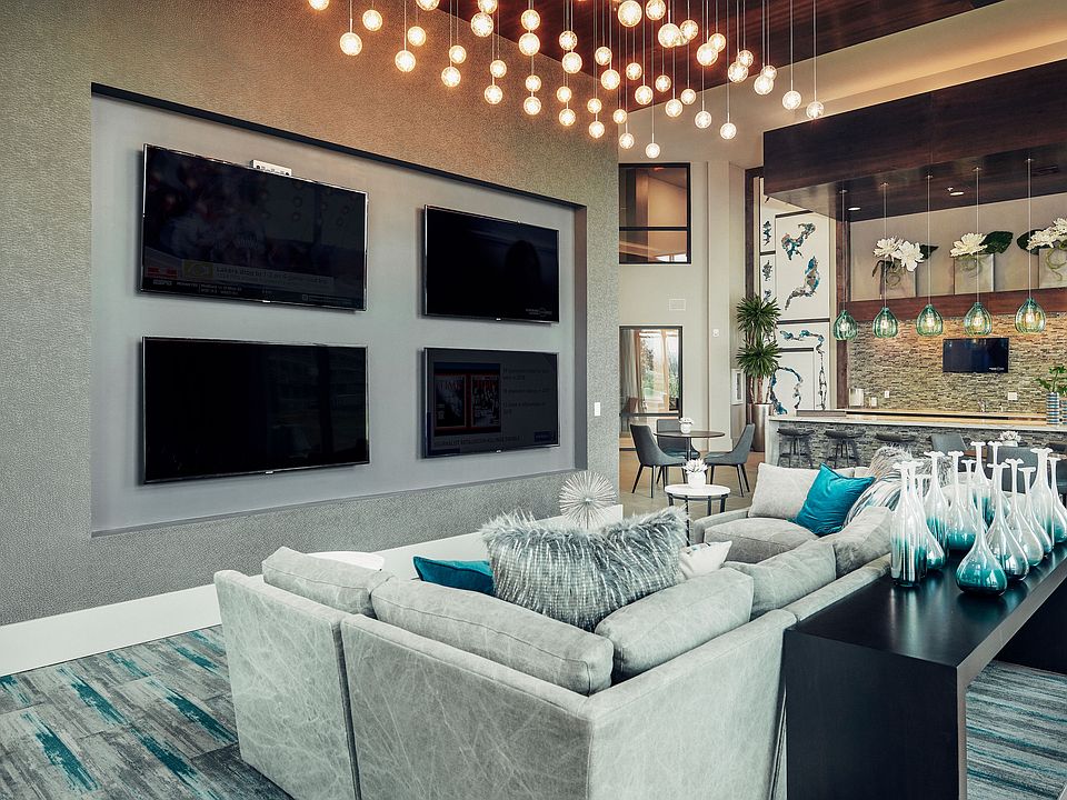 Luxurious Clubhouse with seating and TV's