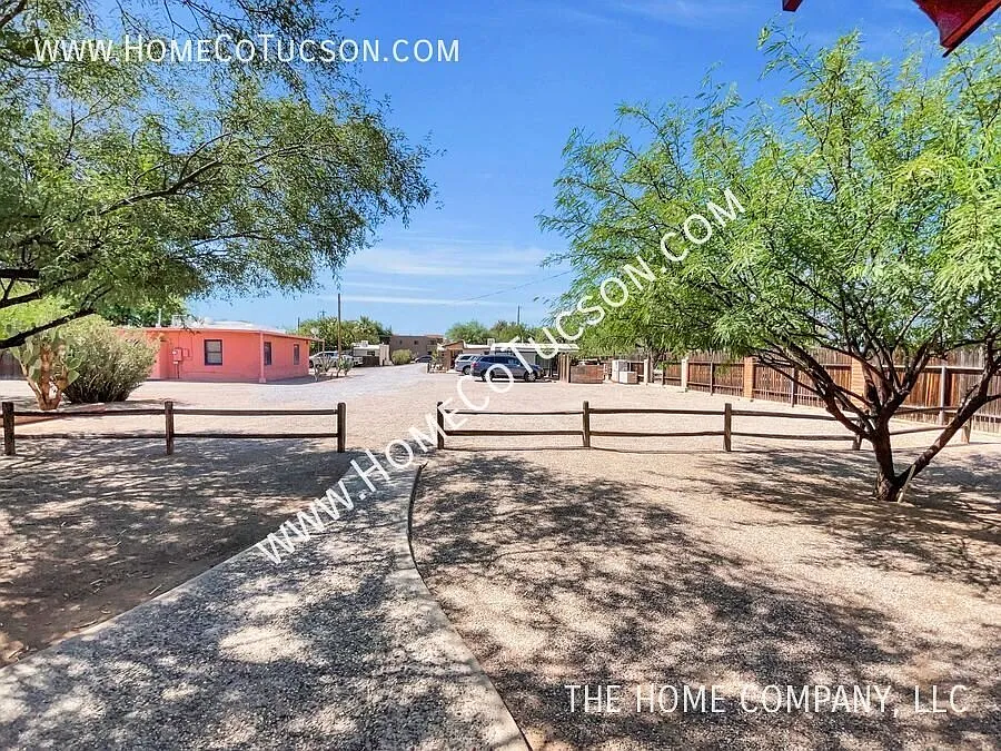 1725 E Adelaide Drive: Charming Brick Home with Private Fenced Yard — Photo 2