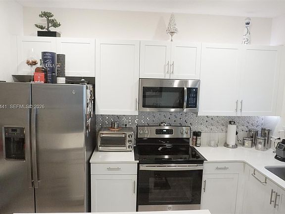 4th image of 10589 W 32nd Ln