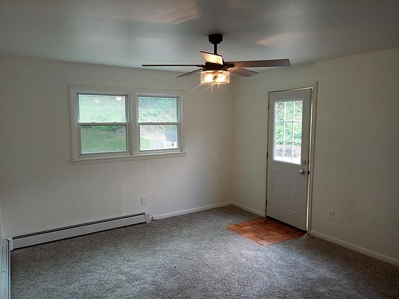 Bedroom One (rear door opens up onto shared patio)