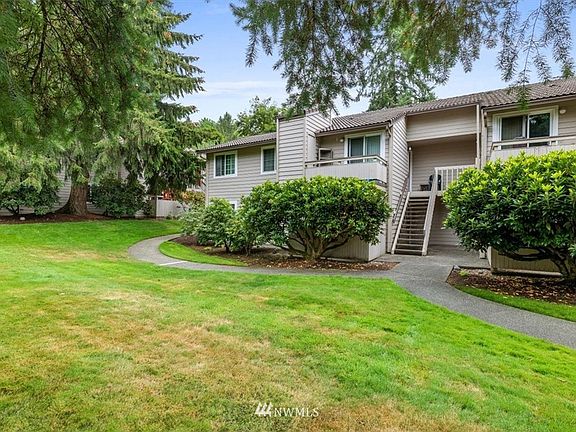 Home is surrounded by the mature landscaped grounds and walking paths.  