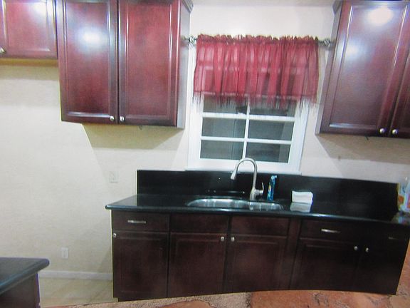 5th image of 7658 Louise Ave