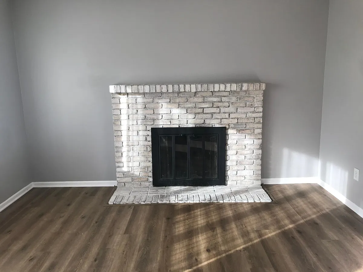 Fireplace in upstairs living room. - 5978 Pine Rise Ct