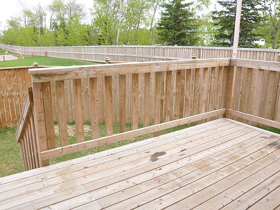 Back deck with fenced bac...
