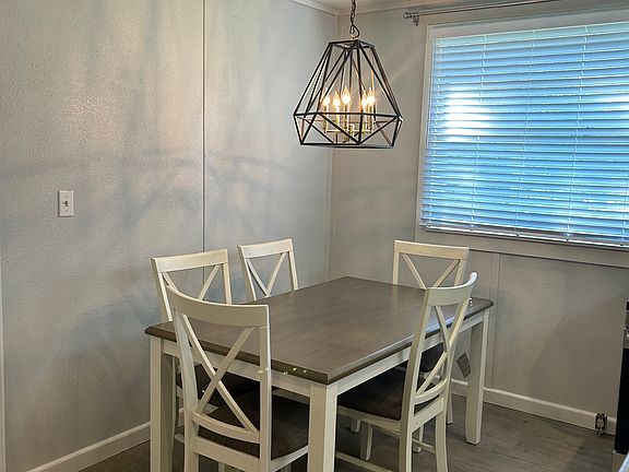 Eat in kitchen; table does not come with the unit, but is for sale.