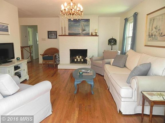 Family Room w/ FP & gleaming HW floors