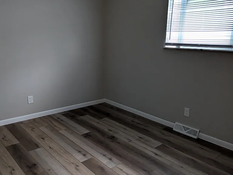 Bedroom with new LVP Flooring