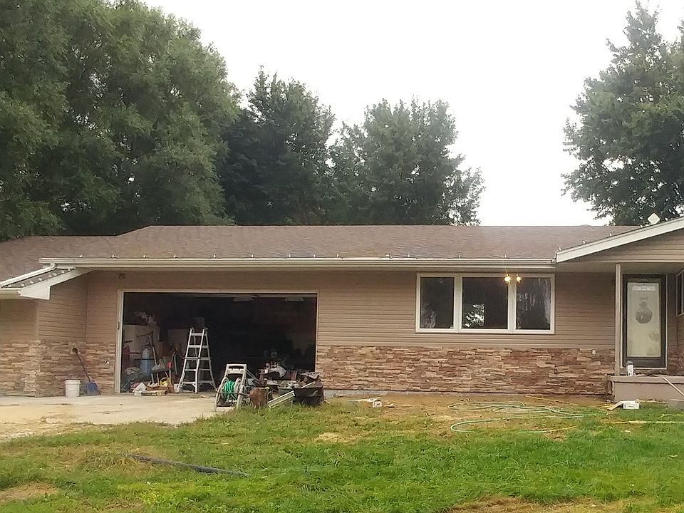 New siding, stone, and roof