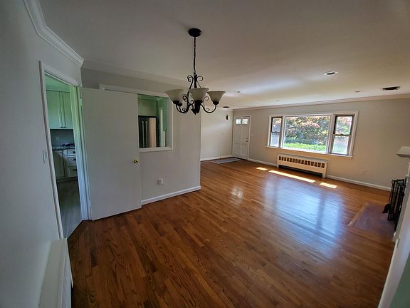 Large Living room with fireplace and dining Room