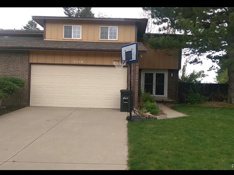 5560 S Lansing Way — Photo 1