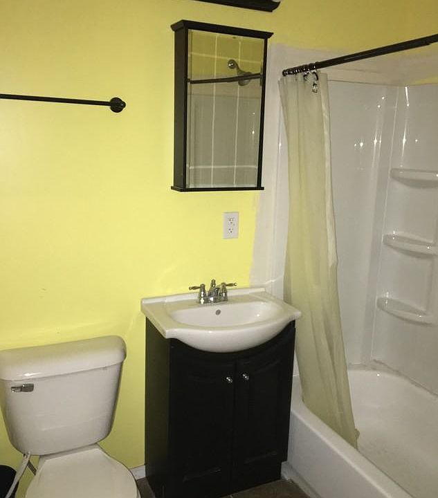 Bathroom with shower and tub. 