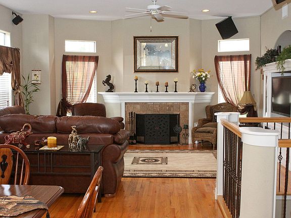 The kitchen overlooks this warm, inviting living area