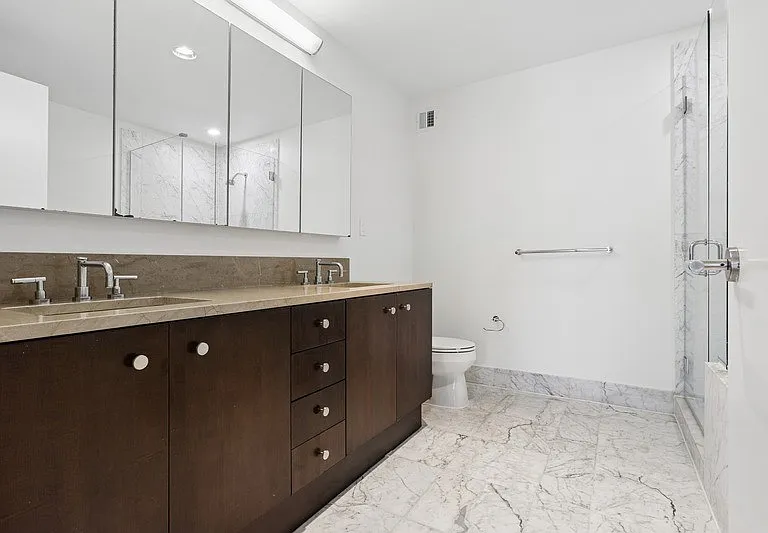 Elevate your lifestyle at Arbor with this stunning bathroom, featuring elegant marble flooring and modern fixtures. Enjoy a spacious design perfect for relaxation. Explore your new home today and envision the possibilities!