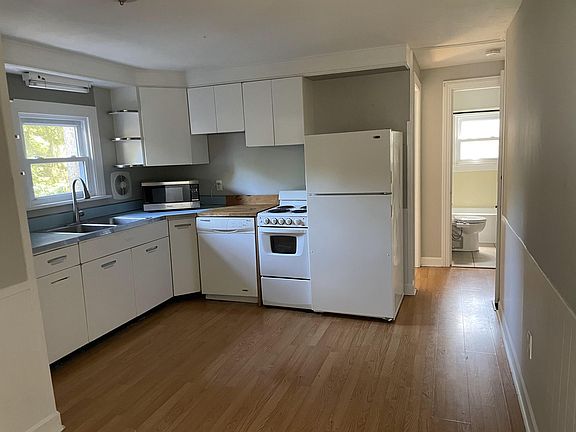 Kitchen and hall to downstairs bedrooms and bath