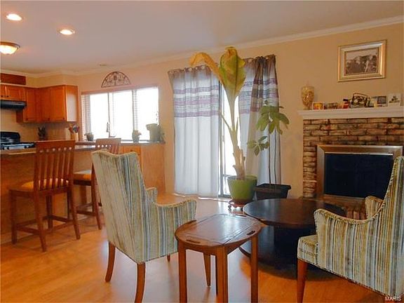 Family room is open to kitchen- very modern floor plan. Sliding door leads to patio and fenced back yard.