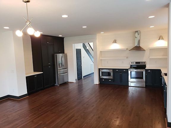 View of kitchen & dining area from living room.