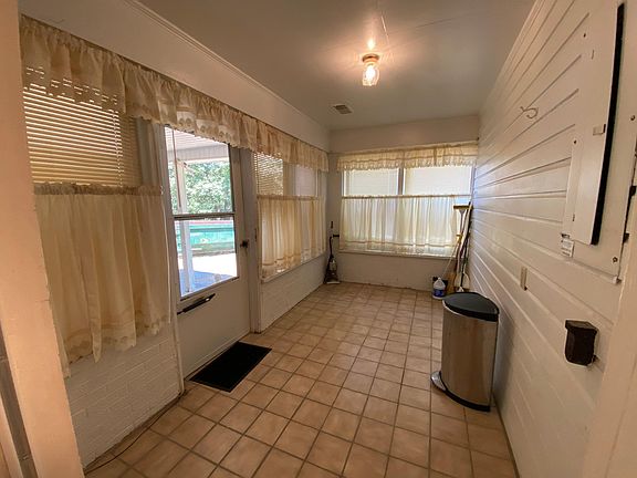 back porch that leads to carport from the kitchen