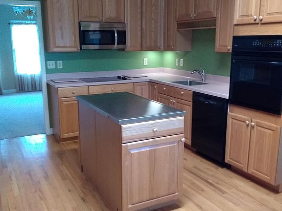 Kitchen with sub zero refrigerator and island for preparing those unforgettable gatherings