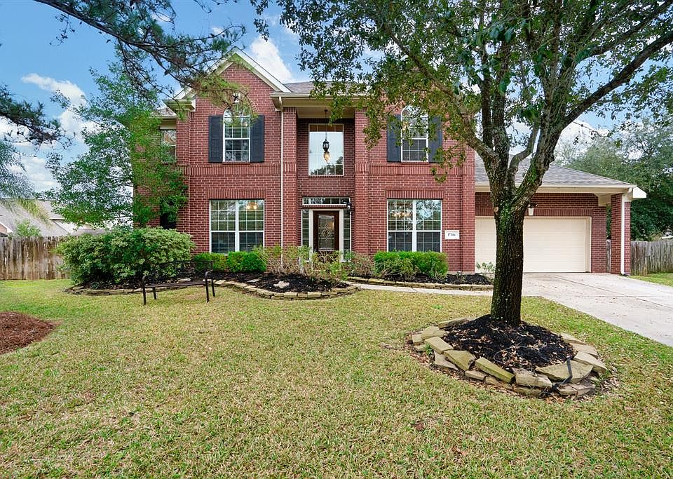 Gorgeous traditional style 2-story brick home in the established neighborhood of Village Creek.