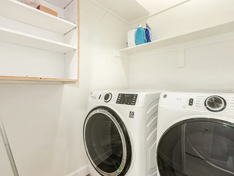 Laundry Room with Newer Washer and Dryer.